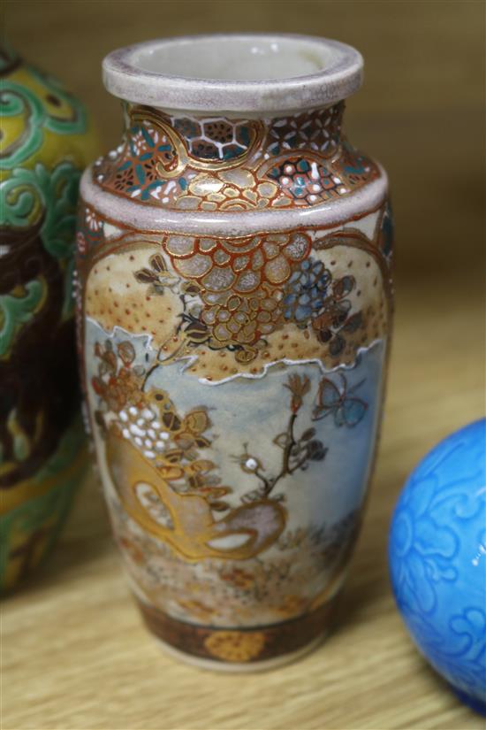 A Chinese Sancai glazed vase, a celadon vase and other Oriental ceramics